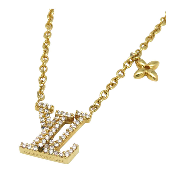 LOUIS VUITTON 
Iniziale Monogramma Fiore Metallo Color Oro 
Collana iconica LV