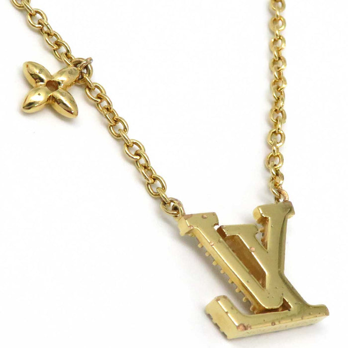 LOUIS VUITTON 
Iniziale Monogramma Fiore Metallo Color Oro 
Collana iconica LV