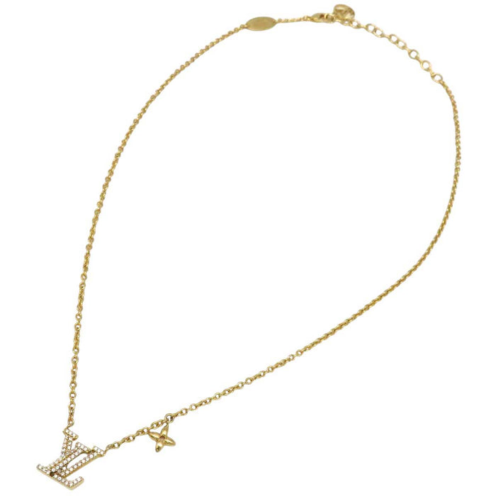 LOUIS VUITTON 
Iniziale Monogramma Fiore Metallo Color Oro 
Collana iconica LV