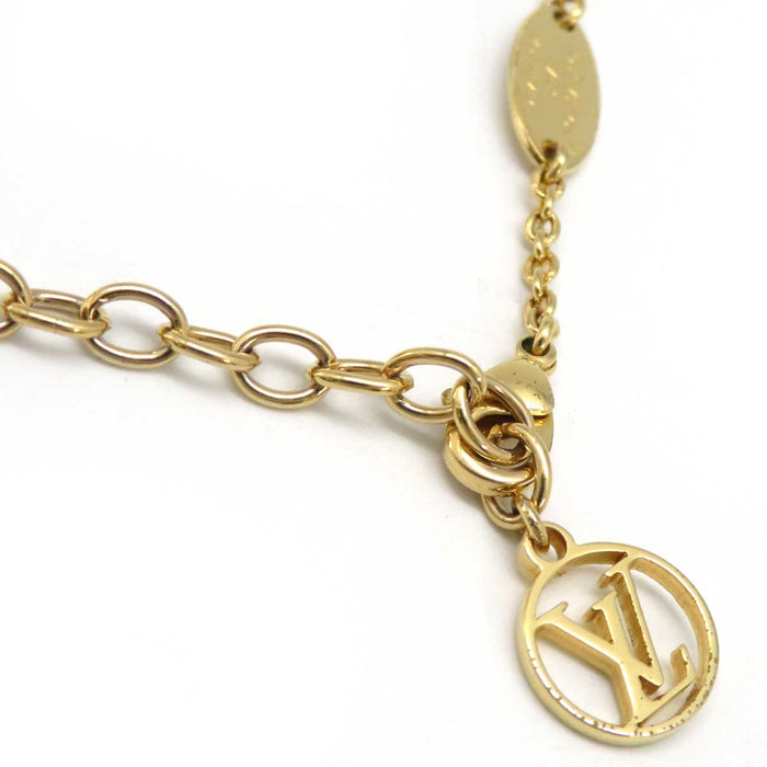 LOUIS VUITTON 
Iniziale Monogramma Fiore Metallo Color Oro 
Collana iconica LV