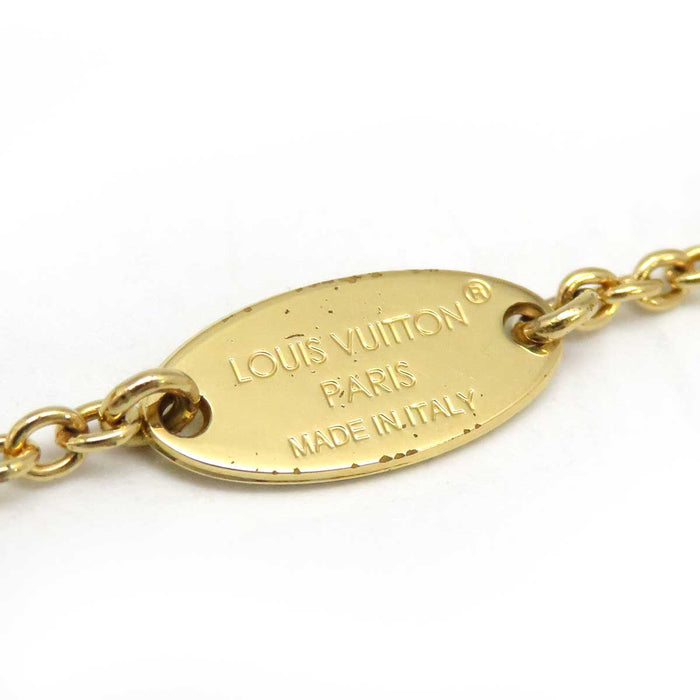 LOUIS VUITTON 
Iniziale Monogramma Fiore Metallo Color Oro 
Collana iconica LV
