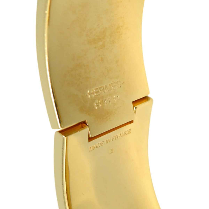 ERMETE 
Bracciale in smalto grande GP in metallo dorato giallo 
Clicca CrackH Cadolijou o Fil Bracciale