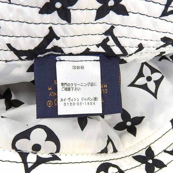 LOUIS VUITTON 
Logo LV reversibile all-over 
Cappello da pescatore in nylon con monogramma