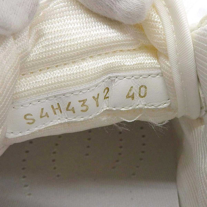VALENTINO 
Leather Studs Logo 
Garavani Freedot Lowtop Sneakers