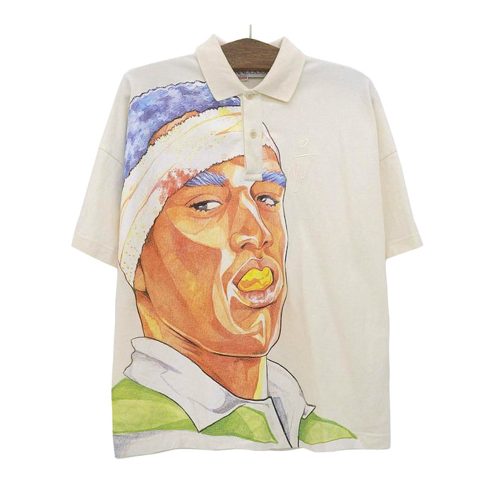 J.W.Anderson. 
JW Anderson Oversize 
J.W.ANDERSON POL ANGLADA Printed Polo Shirt