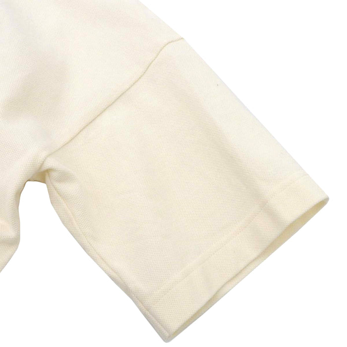 J.W.Anderson. 
JW Anderson Oversize 
J.W.ANDERSON POL ANGLADA Printed Polo Shirt