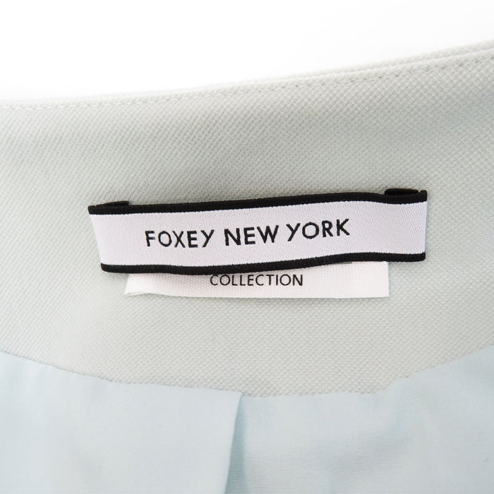 福克斯 
纽约褶饰尼龙 
荷叶边口袋无领大衣 
福克斯纽约