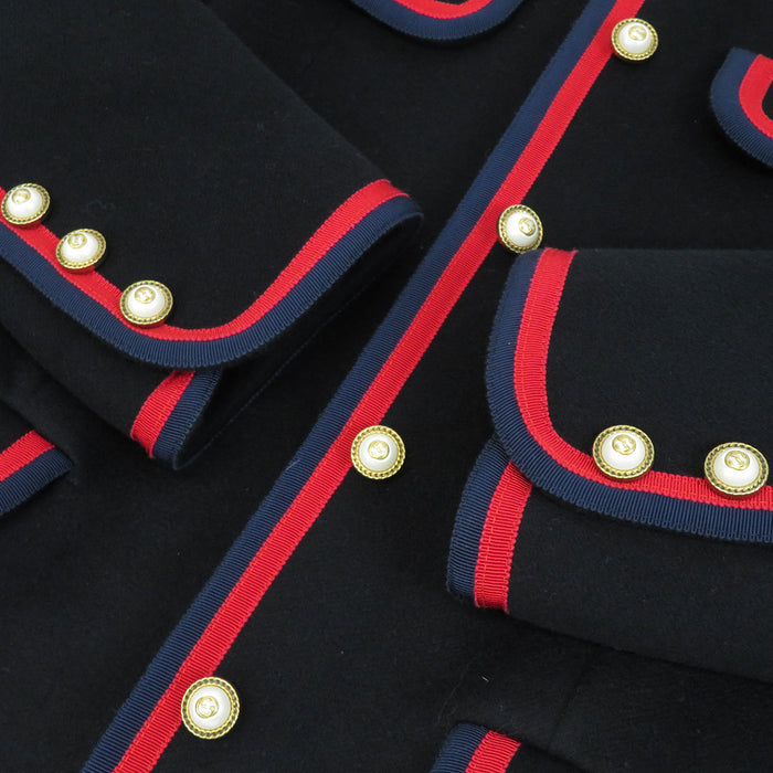 GUCCI 
Interlocking G pearl button 
Web line wool coat