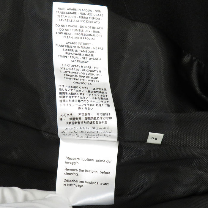 GUCCI 
Interlocking G pearl button 
Web line wool coat