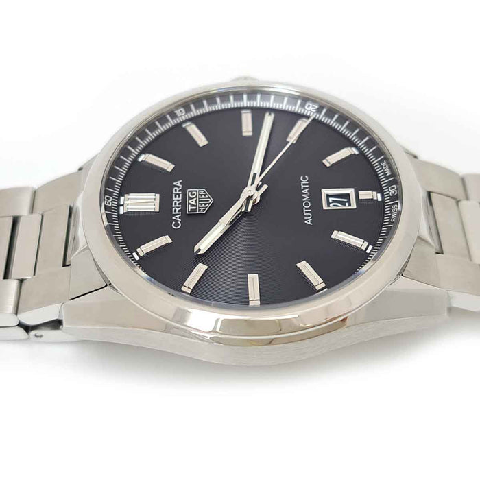 TAG HEUER
Carrera Caliber 5 Date
With box and warranty card