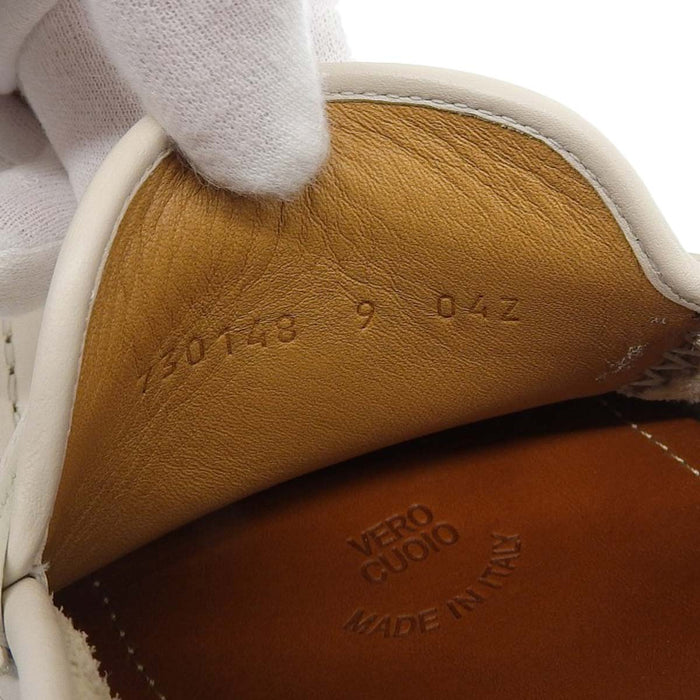 GUCCI
Scarpe da barca con logo GG
Mocassini da guida in pelle con G intrecciata
