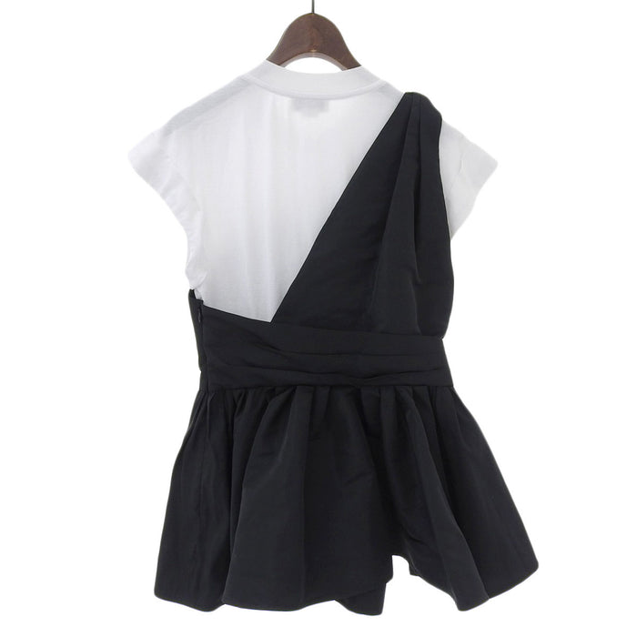 Alexander McQueen 
Top con effetto bustier a peplo incollato e orlo svasato