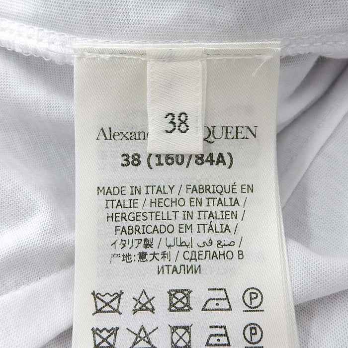 Alexander McQueen 
Top con effetto bustier a peplo incollato e orlo svasato