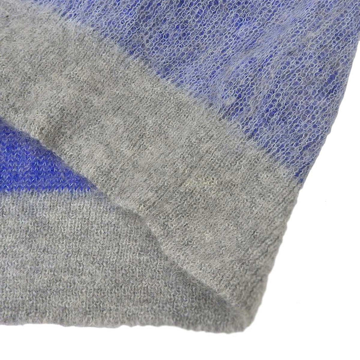 Stella McCartney 
Haut uni 
Pull en bouclé mélangé à manches longues