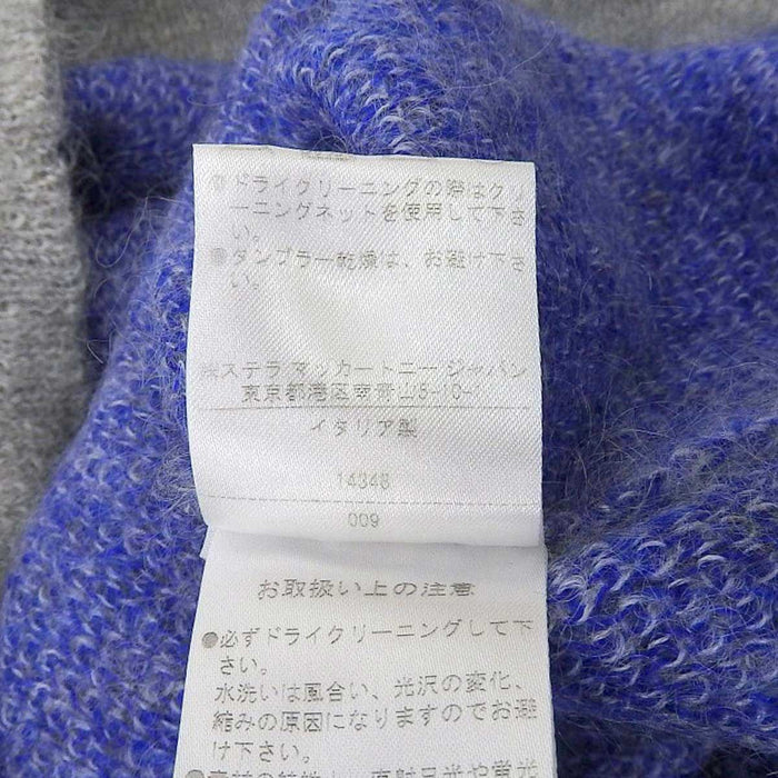 Stella McCartney 
Haut uni 
Pull en maille bouclée mélangée à manches longues
