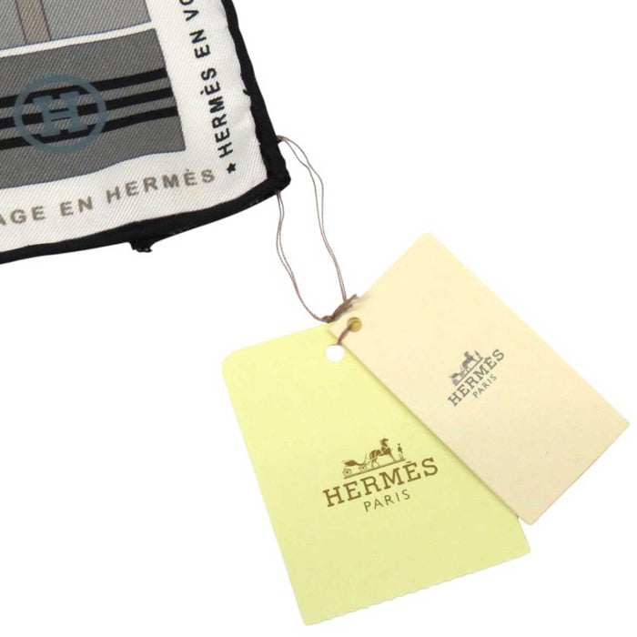 HERMES
Voyage Flag Motif Silk Large Square
Carré 90 HERMES EN VOYAGE Scarf