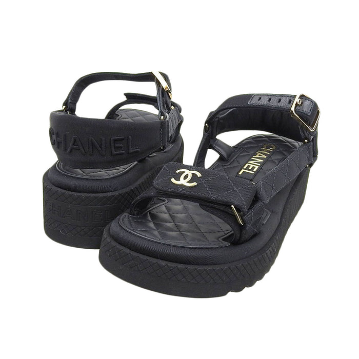 CHANEL
COCO Fabric Leather
Coco Mark Footbed Sandals
Matelassé