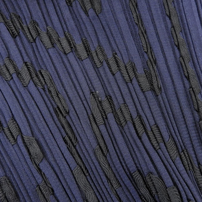 PLEATS PLEASE 
Issey Miyake plissé chemise à manches trois-quarts 
design ruban