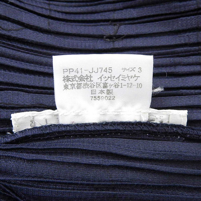 PLEATS PLEASE 
Issey Miyake plissé chemise à manches trois-quarts 
design ruban