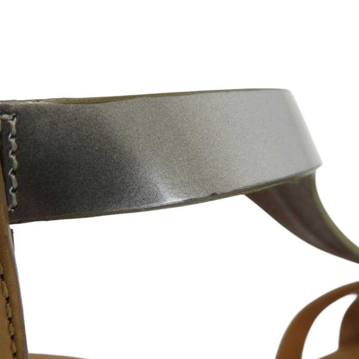 TOD’S 
Métallique 
Sandales en cuir à bride cheville