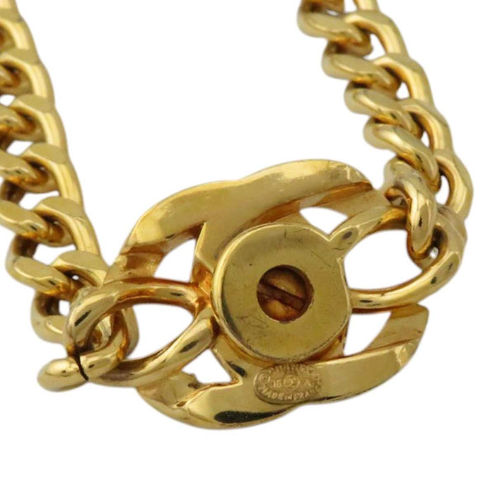 CHANEL 
96A logo COCO CC metallo color oro 
marchio Coco vintage braccialetto a catena curva