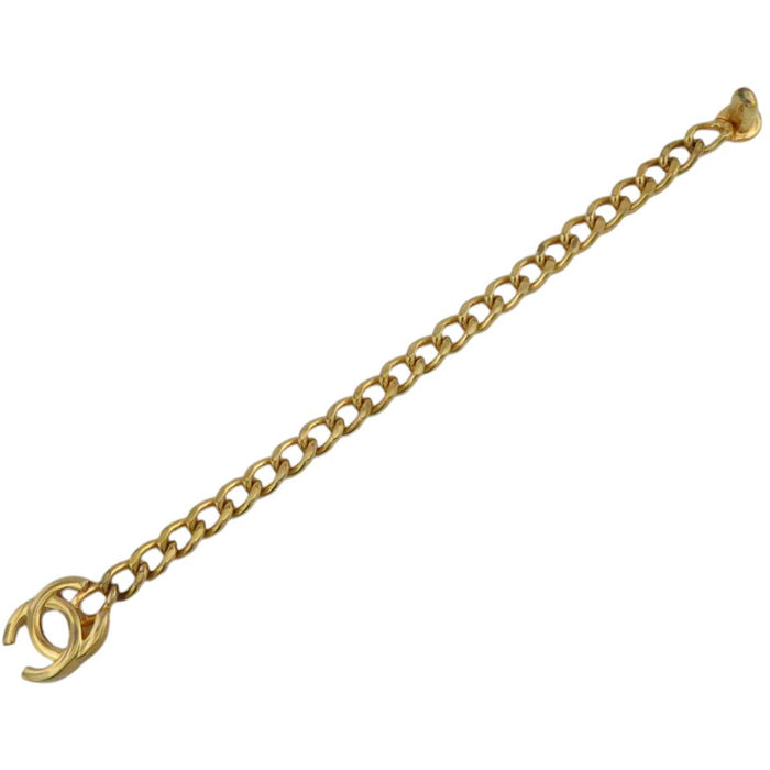 CHANEL 
96A logo COCO CC metallo color oro 
marchio Coco vintage braccialetto a catena curva