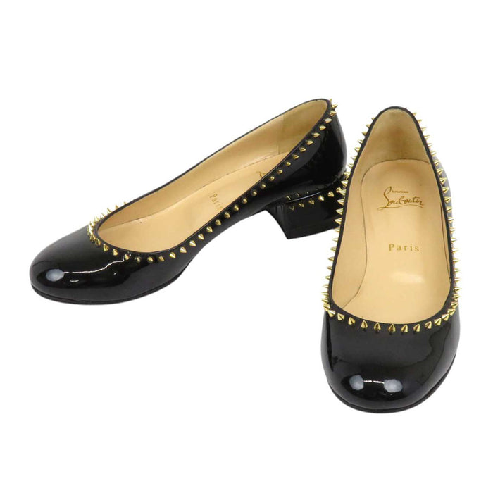 Christian Louboutin
尖钉铆钉漆皮
TRELILIANE 30 高跟鞋