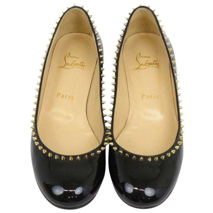 Christian Louboutin
尖钉铆钉漆皮
TRELILIANE 30 高跟鞋