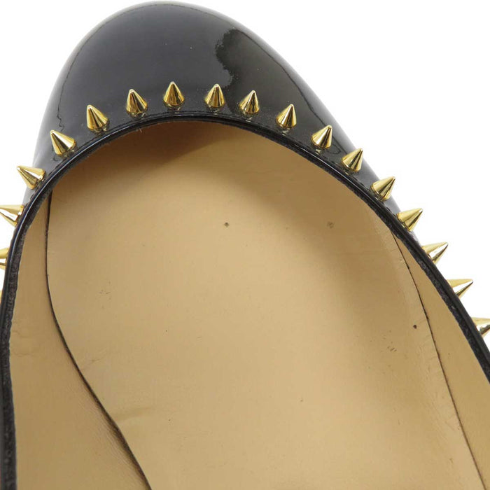 Christian Louboutin
尖钉铆钉漆皮
TRELILIANE 30 高跟鞋