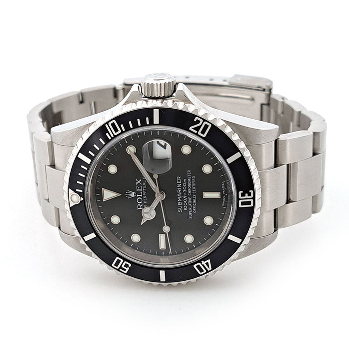 ROLEX 
Submariner M00 Series Early Lot 
With Box and Guarantee Card