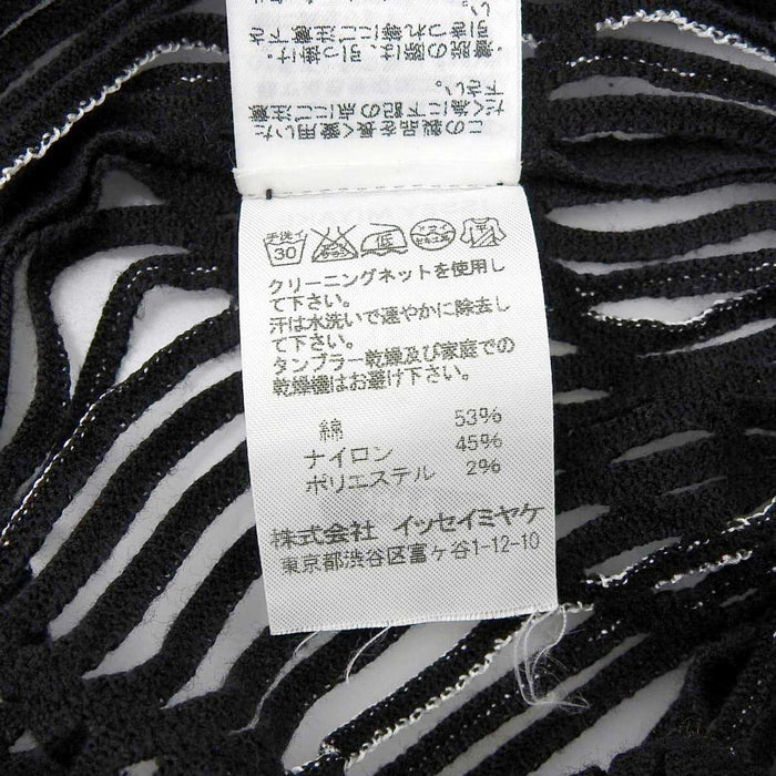 ISSEY MIYAKE 
ISSEY MIYAKE A-POC INSIDE franges transparentes 
maille sans manches au design en mesh