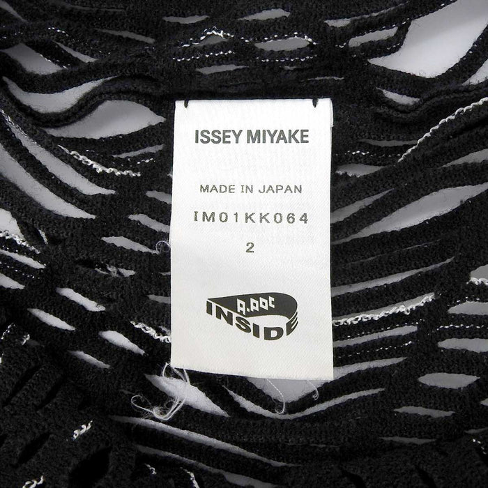 ISSEY MIYAKE 
ISSEY MIYAKE A-POC INSIDE franges transparentes 
maille sans manches au design en mesh