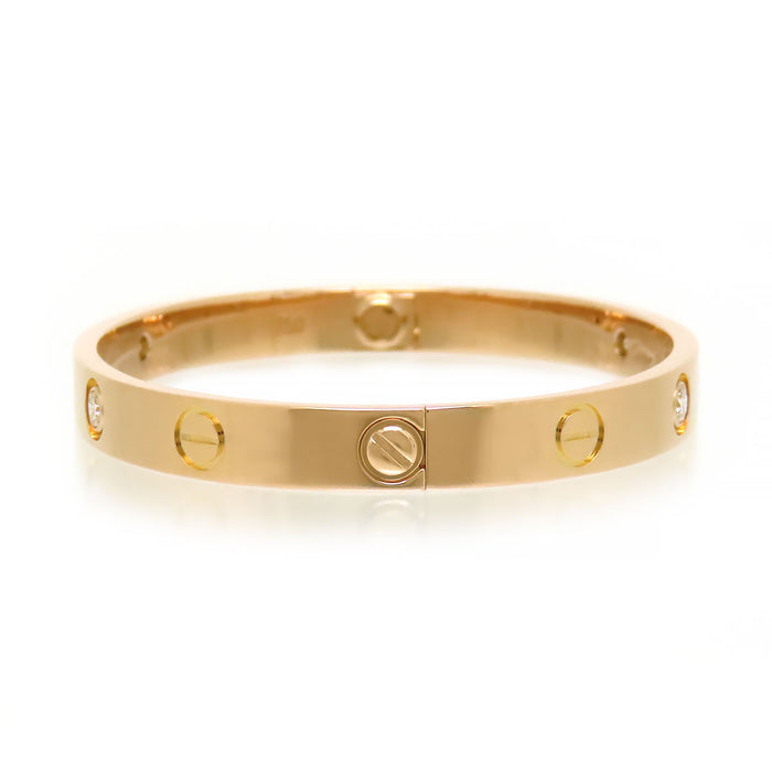 CARTIER 
Braccialetto Love con diamanti parziali
