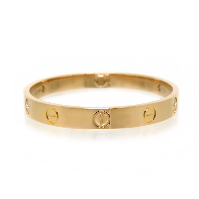 CARTIER 
Braccialetto Love con diamanti parziali