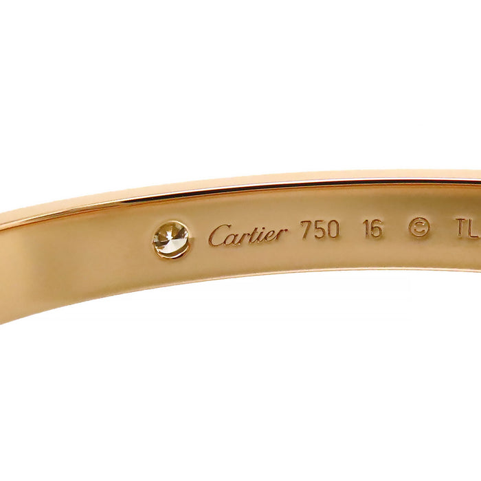 CARTIER 
Braccialetto Love con diamanti parziali