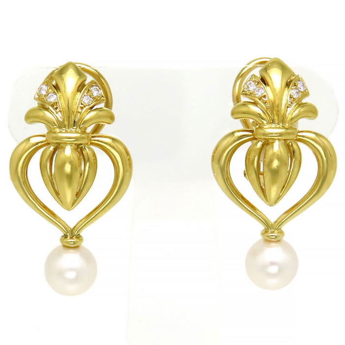 MIKIMOTO 
Orecchini a cuore con charm intercambiabile
