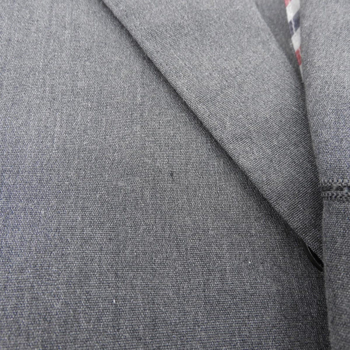 THOM BROWNE 
linguetta ad anello a righe 
giacca a maniche corte