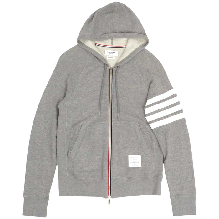 THOM BROWNE
Felpa con cappuccio con zip a righe in cotone
Completo felpa 4 BAR