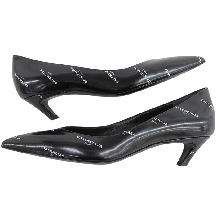 BALENCIAGA
Logo all-over pattern diagonal heel design
Logo slash heel pumps