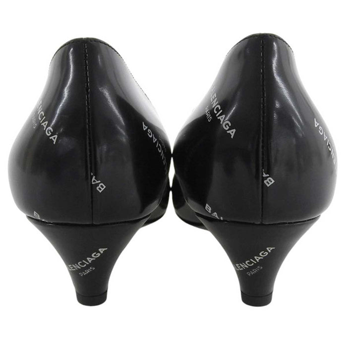 BALENCIAGA
Logo all-over pattern diagonal heel design
Logo slash heel pumps