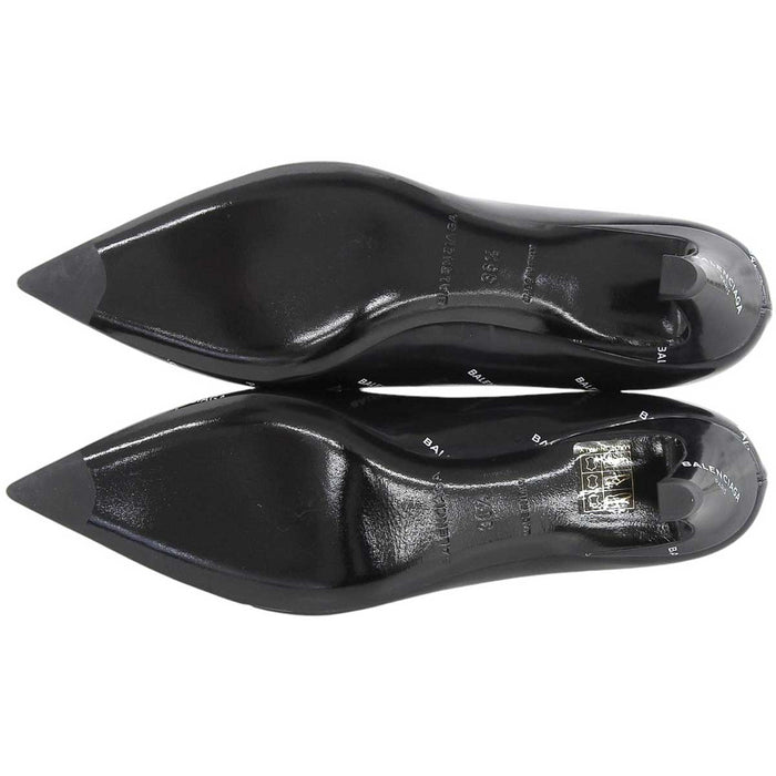 BALENCIAGA
Logo all-over pattern diagonal heel design
Logo slash heel pumps