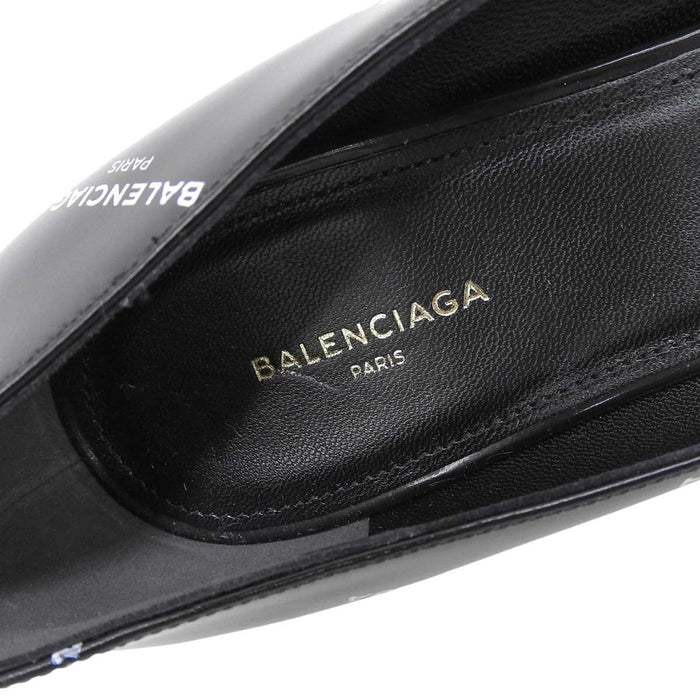 BALENCIAGA
Logo all-over pattern diagonal heel design
Logo slash heel pumps