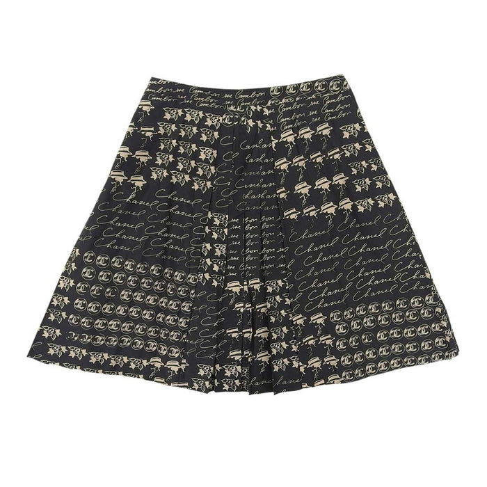 CHANEL 
06C ロゴ COCO CC マドモアゼル 
ココマーク カメリア 総柄 フロントプリーツ スカート