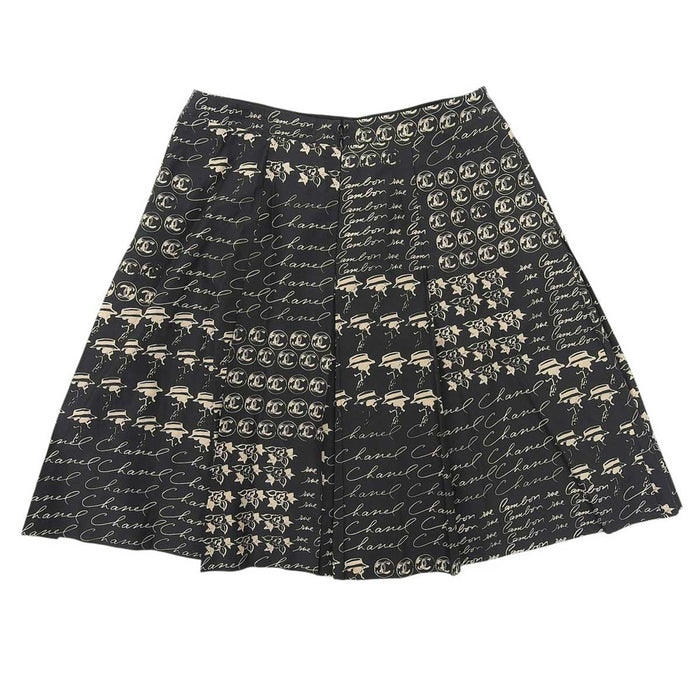 CHANEL 
06C ロゴ COCO CC マドモアゼル 
ココマーク カメリア 総柄 フロントプリーツ スカート
