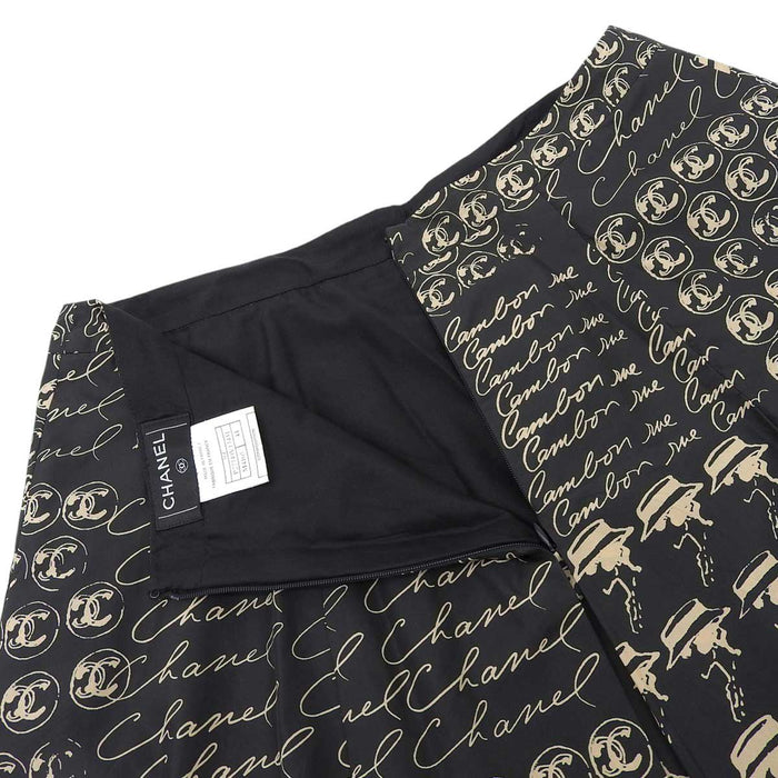 CHANEL 
06C ロゴ COCO CC マドモアゼル 
ココマーク カメリア 総柄 フロントプリーツ スカート