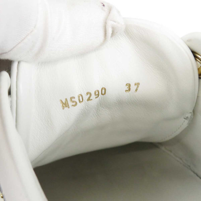LOUIS VUITTON
LV Logo Studs
Front Row Line Leather Sneakers
Monogram