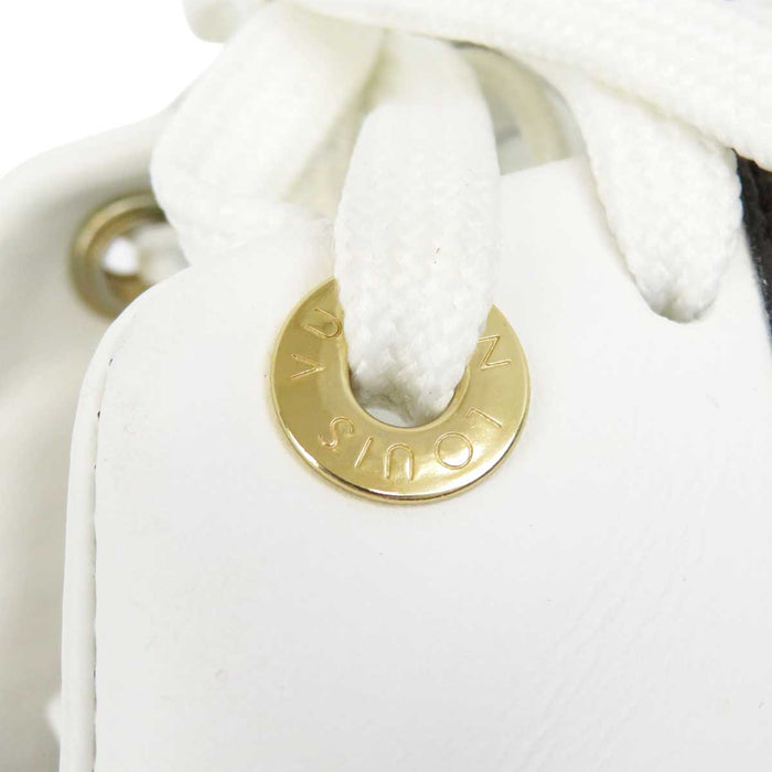 LOUIS VUITTON
LV Logo Studs
Front Row Line Leather Sneakers
Monogram