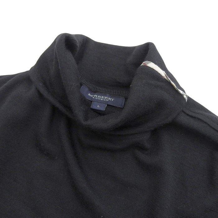 BURBERRY
Check 3/4 Sleeve
Merino Wool High Neck Knit