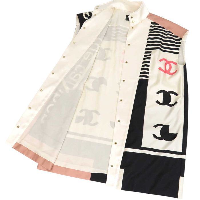 CHANEL 
COCO Bouton rue Cambon 31 Col montant 
Marque Coco Soie Sans manches Chemise longue