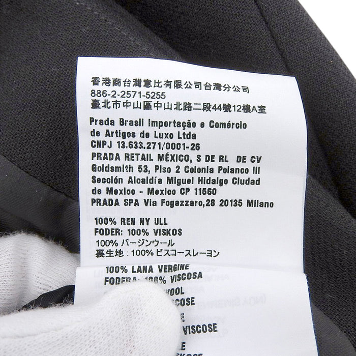 MIUMIU
Wool Button
Logo Mini Wrap Skirt